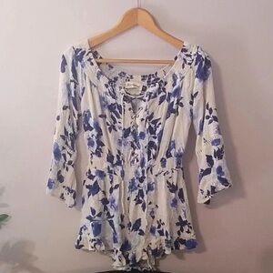 B. Original Blue and White Floral Lace Up Romper size small